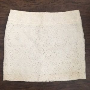Cream flower pattern mini skirt